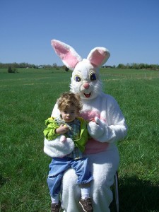 Caleb sits with the Easter Bunny